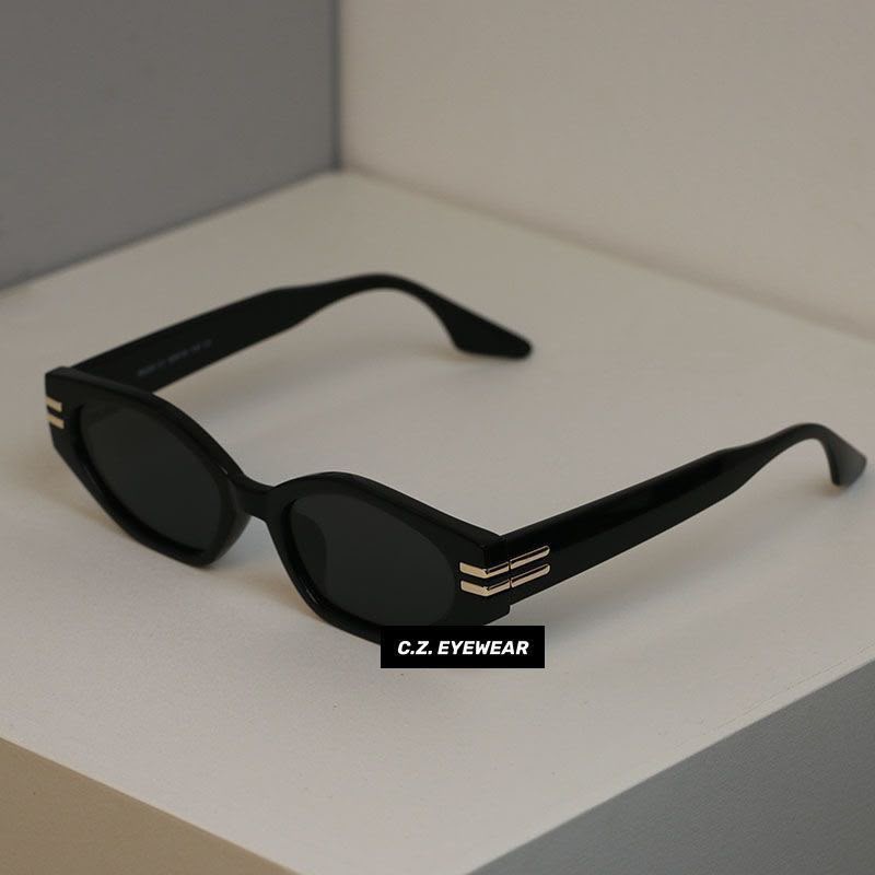 Matte Black Oval Frame Sunglasses with Gold Hardware — image 1